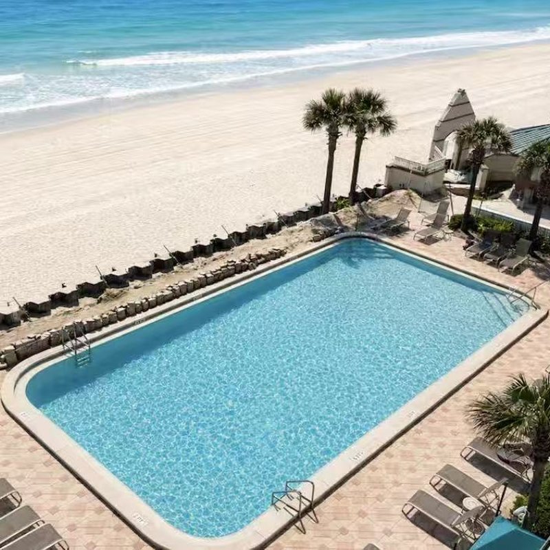 Aerial view of the resort pool and beach