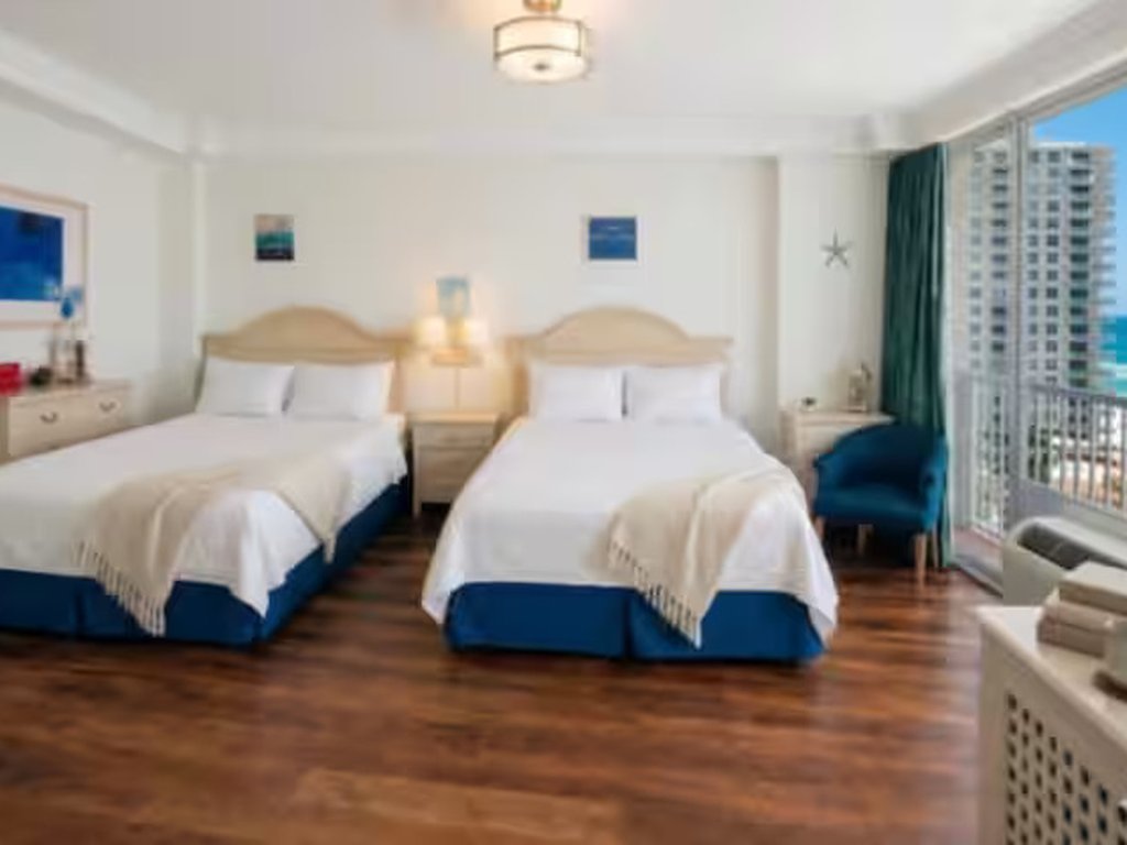 Atlantic Breeze one-bedroom suite bedroom with balcony